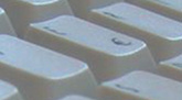 Das Foto zeigt einige Tasten von einer Computertastatur.